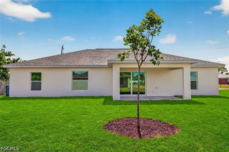 Exterior details and patio area of a home in Cape Coral, Cape Coral (Image 3).