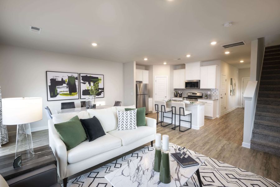 The open-concept floorplan allows for easy entertaining. Photography from Foxcroft Townes. The open-concept floorplan allows for easy entertaining. Photography from Foxcroft Townes.