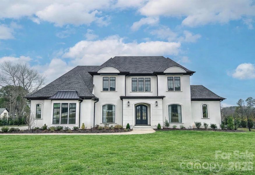 Front exterior of a new home in , Weddington, NC, highlighting curb appeal (Image 1). Front exterior of a new home in , Weddington, NC, highlighting curb appeal (Image 1).