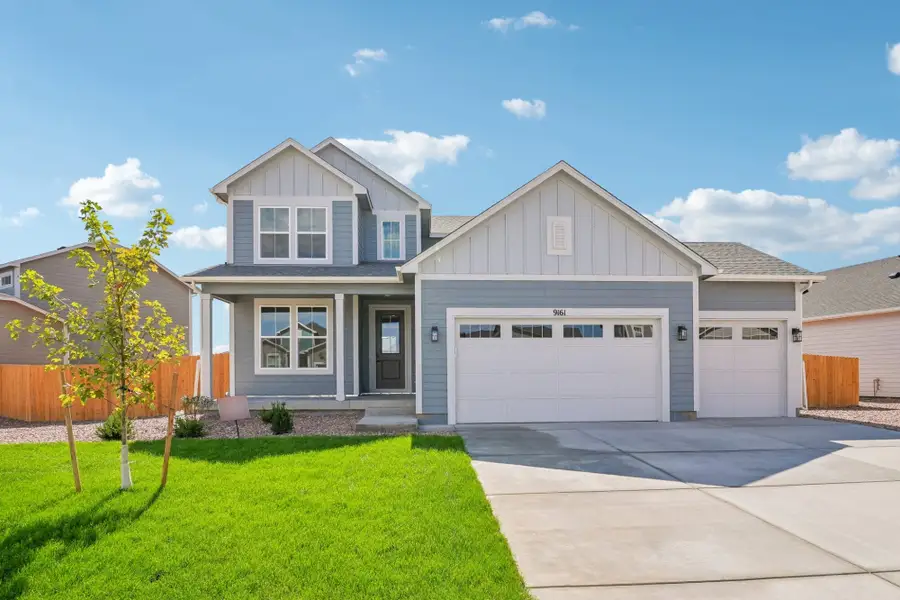 Front exterior of a new home in The Glen, Colorado Springs, CO, highlighting curb appeal (Image 1). Front exterior of a new home in The Glen, Colorado Springs, CO, highlighting curb appeal (Image 1).