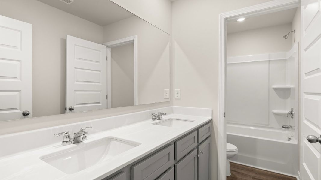 Representative furnished interior of a home built from the Ashmore by D.R. Horton in Brookland Commons, Monroe (Image 13).