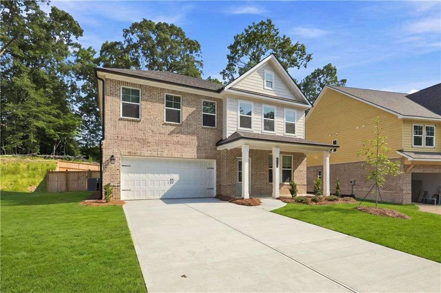 Front exterior of a new home in Hamilton Lakes, Lawrenceville, GA, highlighting curb appeal (Image 17). Front exterior of a new home in Hamilton Lakes, Lawrenceville, GA, highlighting curb appeal (Image 17).