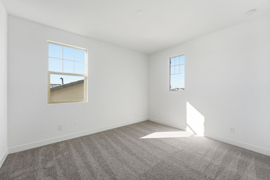 Spacious, unfurnished interior of a new home in Ellsworth Ranch, Queen Creek (Image 35).
