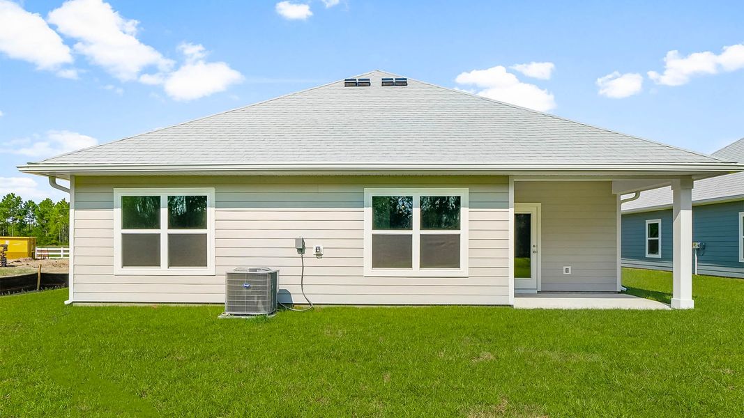 Exterior details and patio area of a home in Buffer Farms, Port Saint Joe (Image 4).