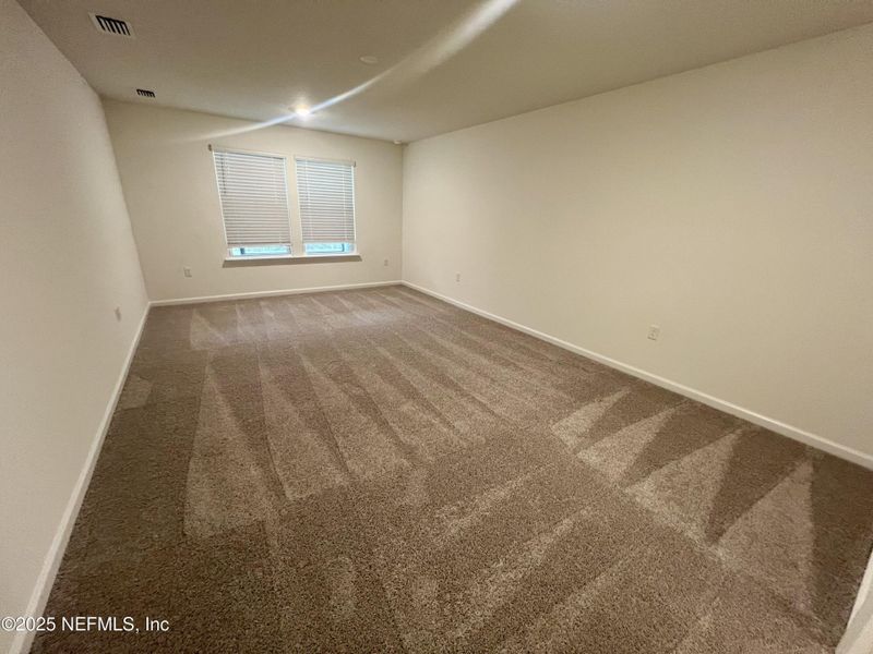 Spacious, unfurnished interior of a new home in , Green Cove Springs (Image 12).