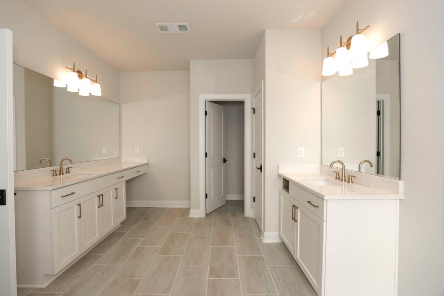 Representative furnished interior of a home built from the The Maddox by The Providence Group in Bellmoore Park, Johns Creek (Image 19).