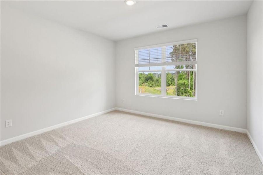 Spacious, unfurnished interior of a new home in The Hills at Cedar Creek, Winder (Image 25).