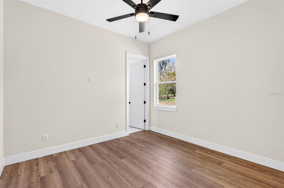 Spacious, unfurnished interior of a new home in , Dade City (Image 39).