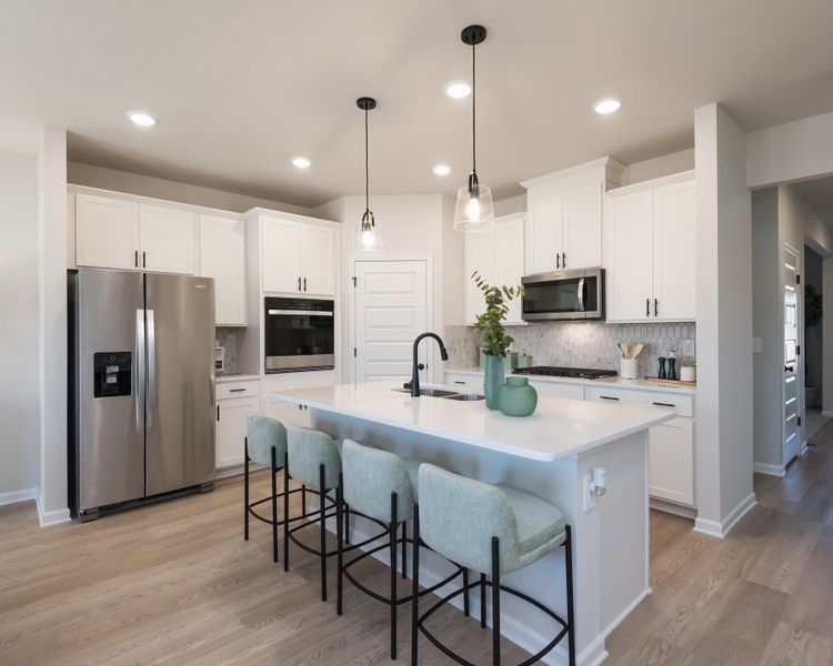 Furnished interior view inside a new home in Vines at Mill Creek - Estate Series, Braselton (Image 4).