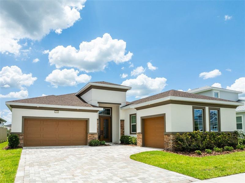 Front exterior of a new home in , Wesley Chapel, FL, highlighting curb appeal (Image 24).