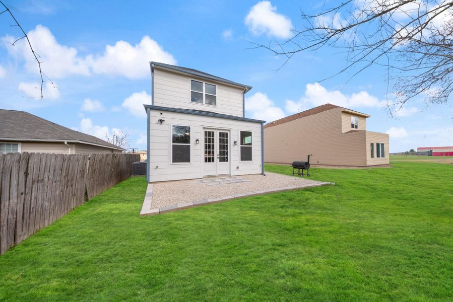 Exterior details and patio area of a home in , Sealy (Image 4).