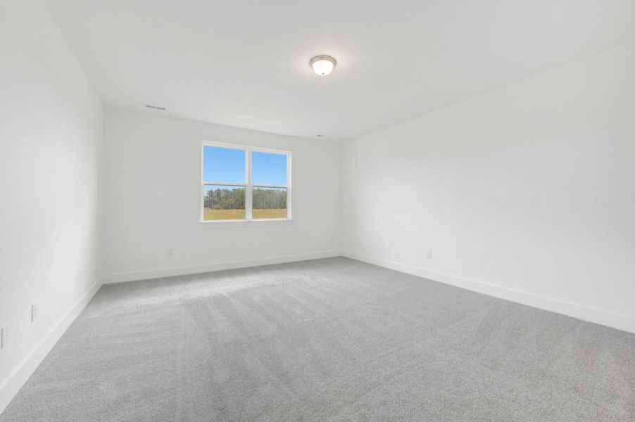 Spacious, unfurnished interior of a new home in McAlister Creek, Clayton (Image 23).