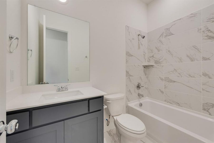 Bathroom with shower / tub combination and vanity Bathroom with shower / tub combination and vanity