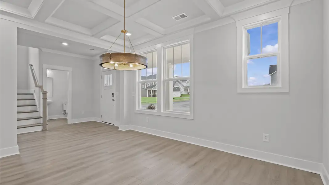 Highly skilled execution of coffered ceiling design in this first-rate dining area