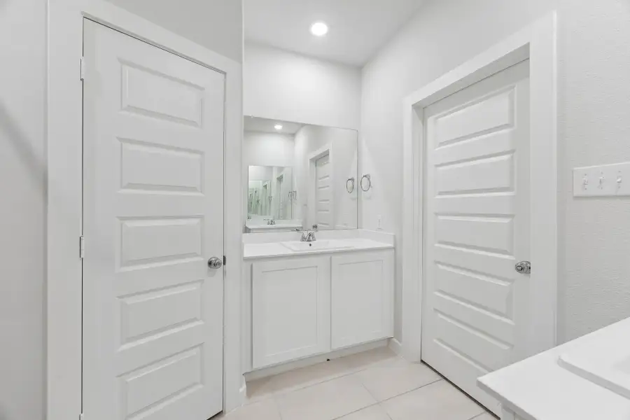 Primary Bathroom in the Cedar home plan by Trophy Signature Homes – REPRESENTATIVE PHOTO Primary Bathroom in the Cedar home plan by Trophy Signature Homes – REPRESENTATIVE PHOTO