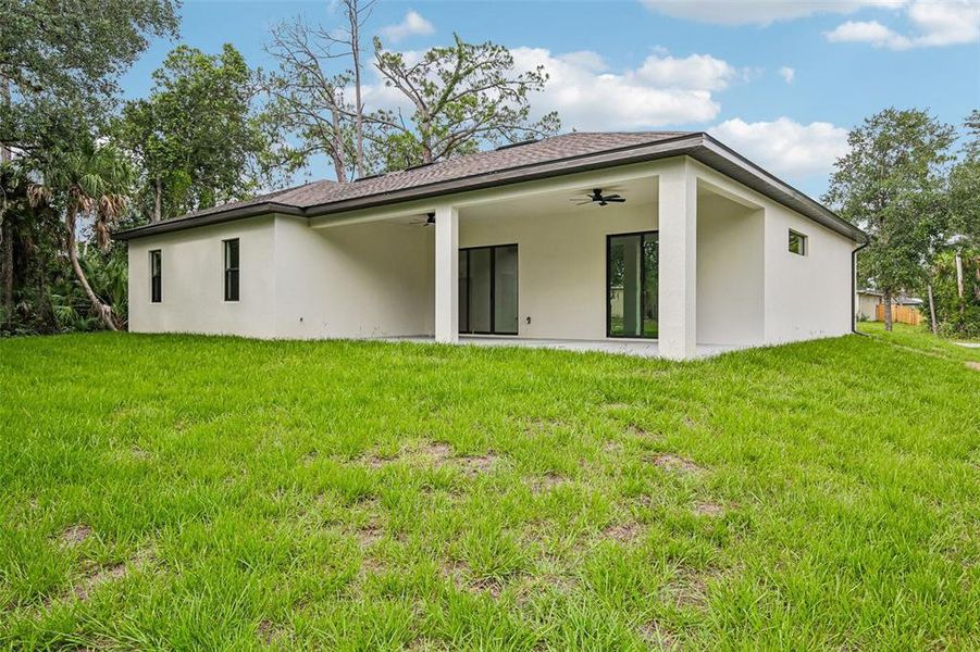 Exterior details and patio area of a home in , North Port (Image 27).