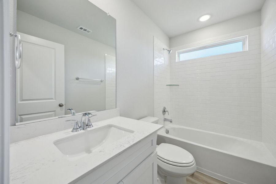Representative furnished interior of a home built from the Isla II by Megatel Homes in Venetian, Celina (Image 6).