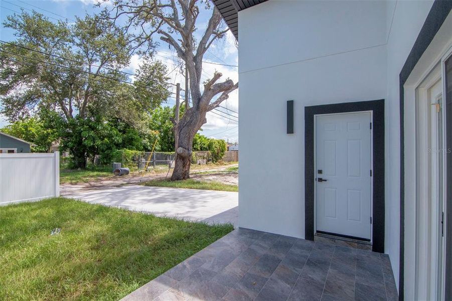 Front exterior of a new home in , Gulfport, FL, highlighting curb appeal (Image 26).