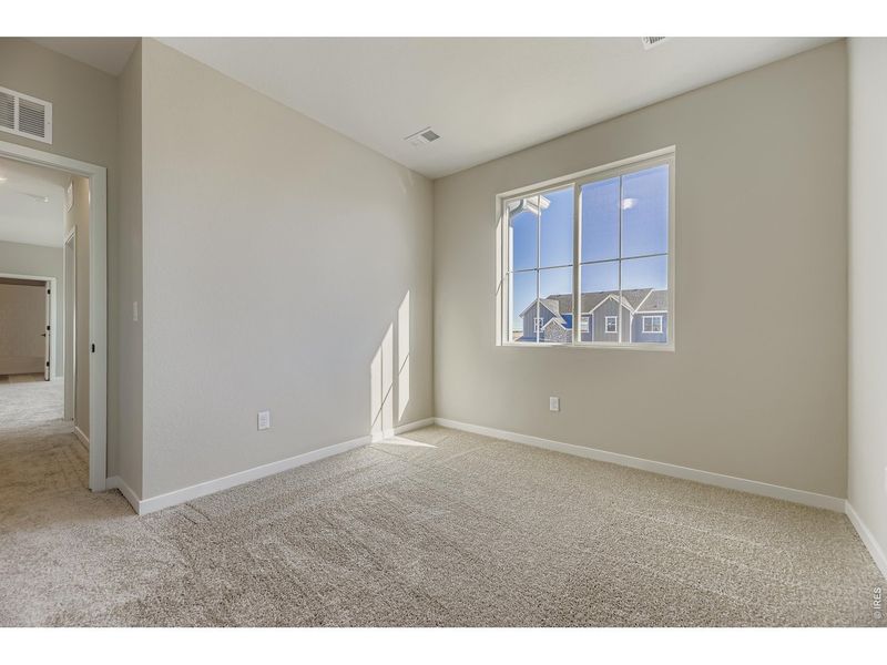 Spacious, unfurnished interior of a new home in Farmstead, Berthoud (Image 23).