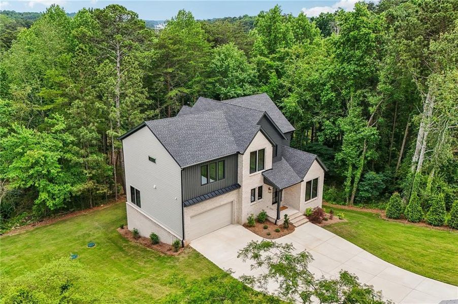 Front exterior of a new home in , Cumming, GA, highlighting curb appeal (Image 32).