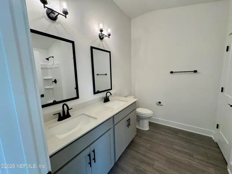 Furnished interior view inside a new home in Shadow Crest at Rolling Hills, Green Cove Springs (Image 7).