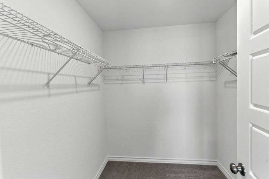 Walk-in Closet in Owner's Suite Walk-in Closet in Owner's Suite