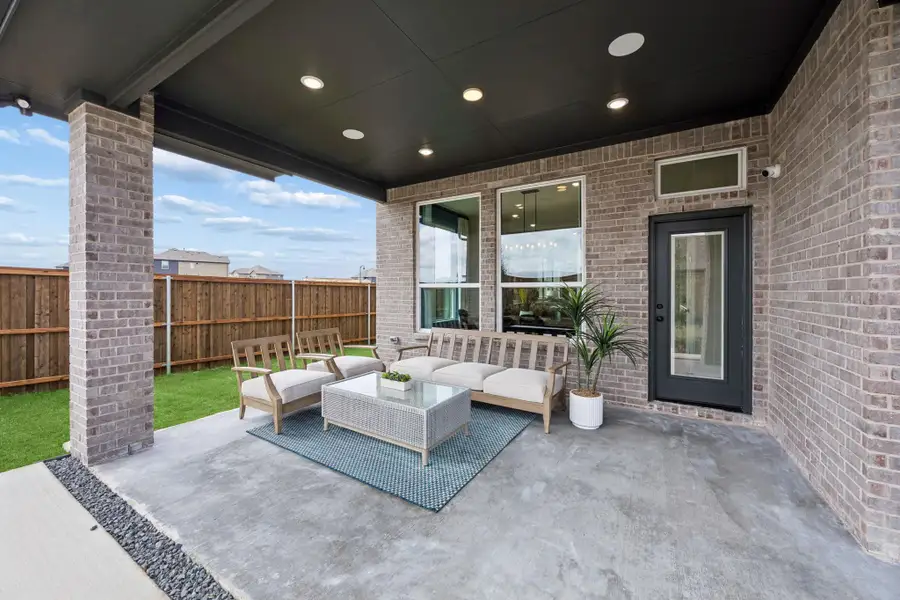 Exterior details and patio area of a home in Las Lomas, Forney (Image 4).