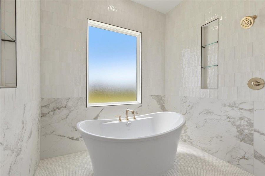 Indulge in a luxurious freestanding tub, poised within a meticulously tiled bathroom. Indulge in a luxurious freestanding tub, poised within a meticulously tiled bathroom.
