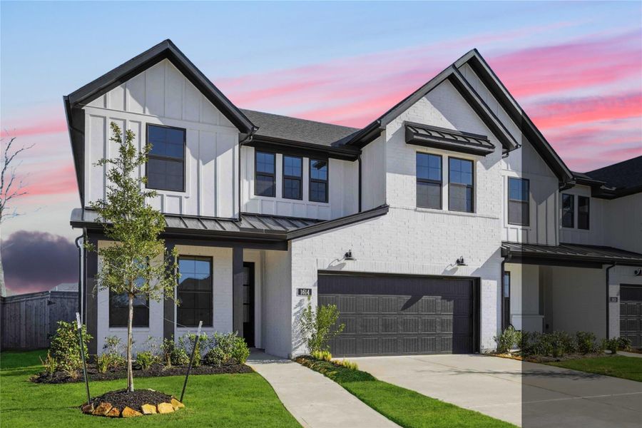 Front exterior of a new home in Sienna, Missouri City, TX, highlighting curb appeal (Image 2). Front exterior of a new home in Sienna, Missouri City, TX, highlighting curb appeal (Image 2).
