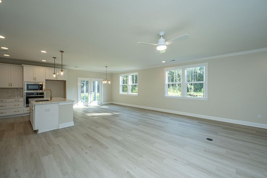 Spacious, unfurnished interior of a new home in , Awendaw (Image 9).