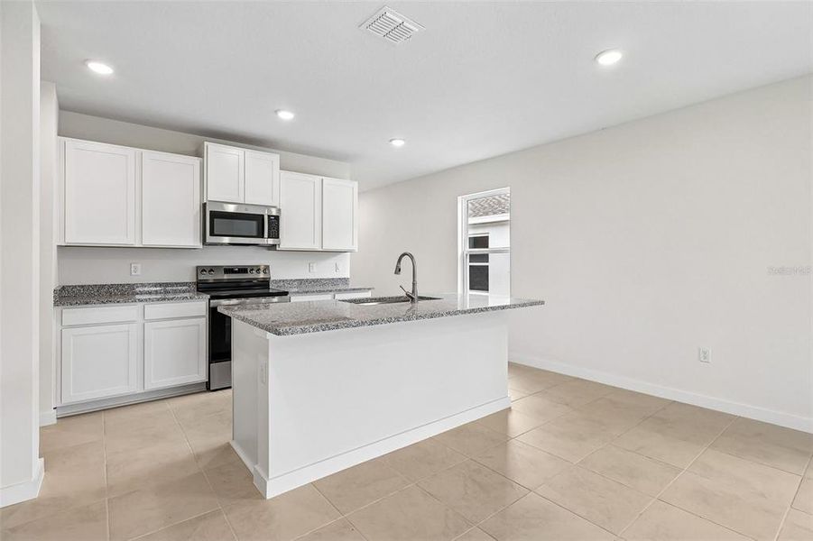 Furnished interior view inside a new home in Liberty Trace, Haines City (Image 6).