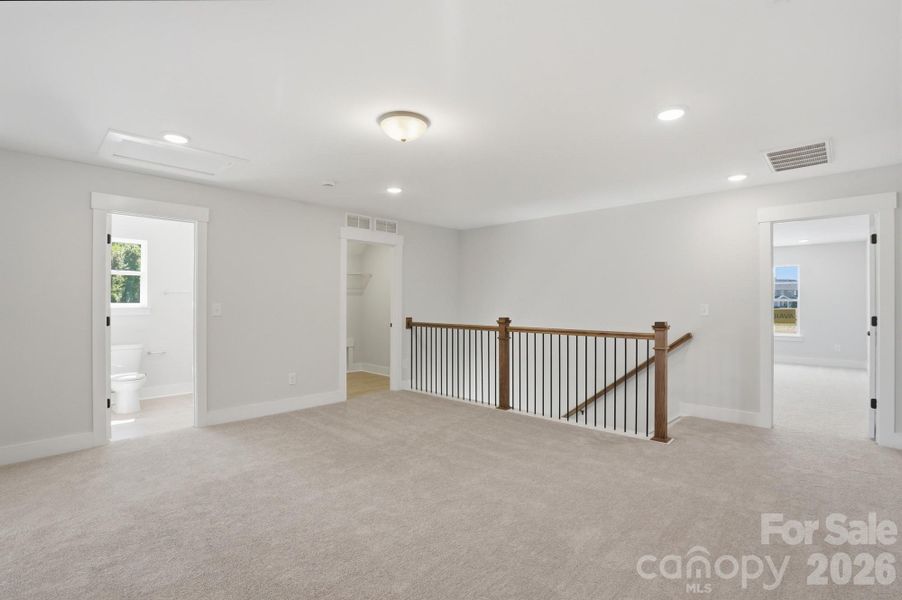 Spacious, unfurnished interior of a new home in Blythe Mill Townhomes, Waxhaw (Image 39).