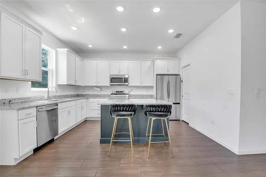 Furnished interior view inside a new home in , Kissimmee (Image 3).