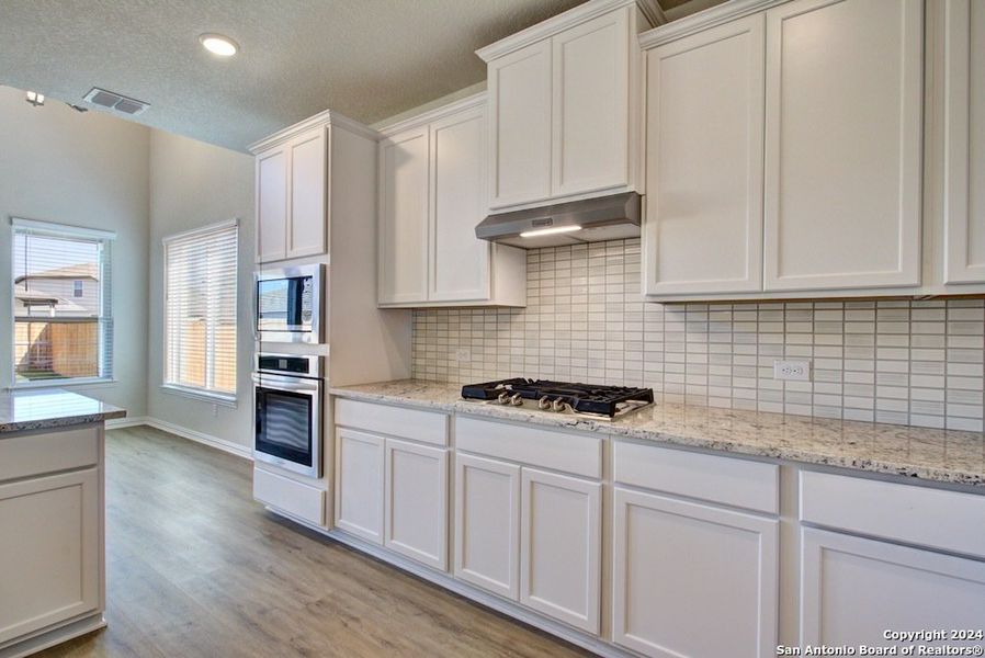 Furnished interior view inside a new home in Veranda, San Antonio (Image 8).