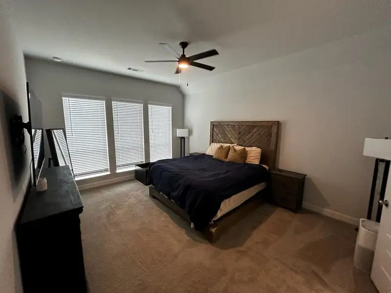Furnished interior view inside a new home in Grand Central Park 45', Conroe (Image 4).