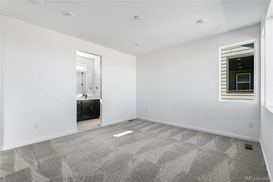 Spacious, unfurnished interior of a new home in Tribute at Lyric, Lone Tree (Image 26).