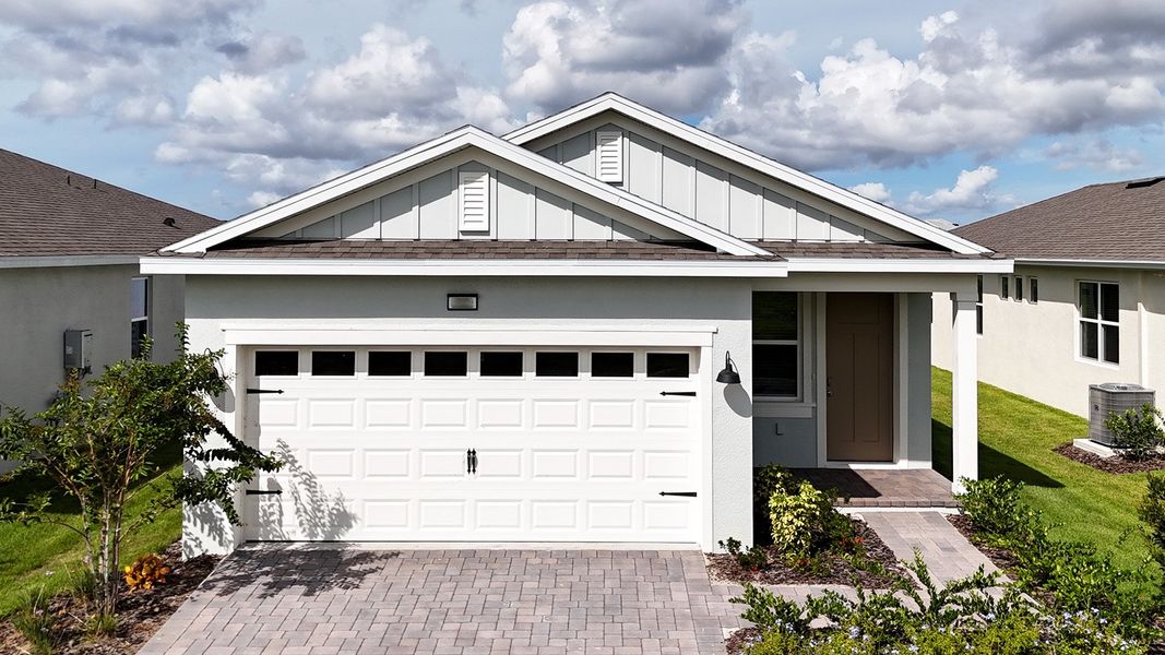 Representative exterior photo of a completed home built from the BOWEN by D.R. Horton in Lakes of Mount Dora, Mount Dora, FL (Image 1).