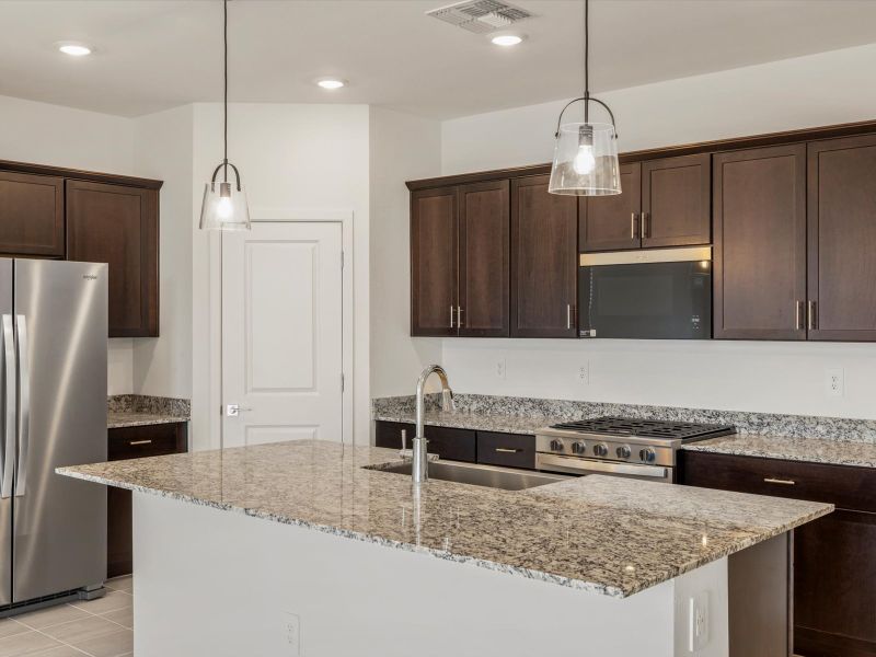 Furnished interior view inside a new home in Mountain View Estates Reserve Series, Buckeye (Image 3).