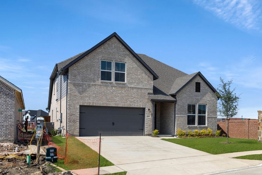 Representative exterior photo of a completed home built from the Honor by Rockwell Homes in Creekside, Royse City, TX (Image 32).