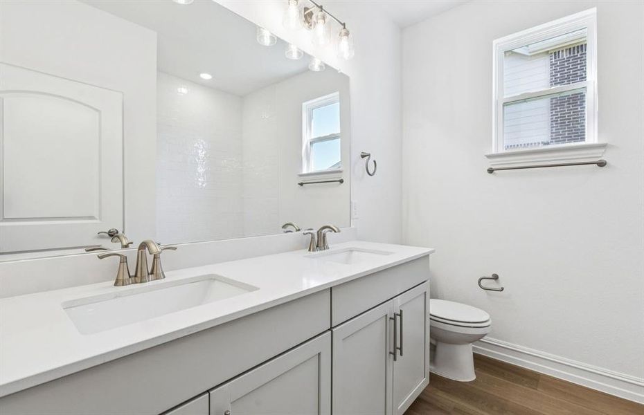 Spacious secondary bathroom with double vanity