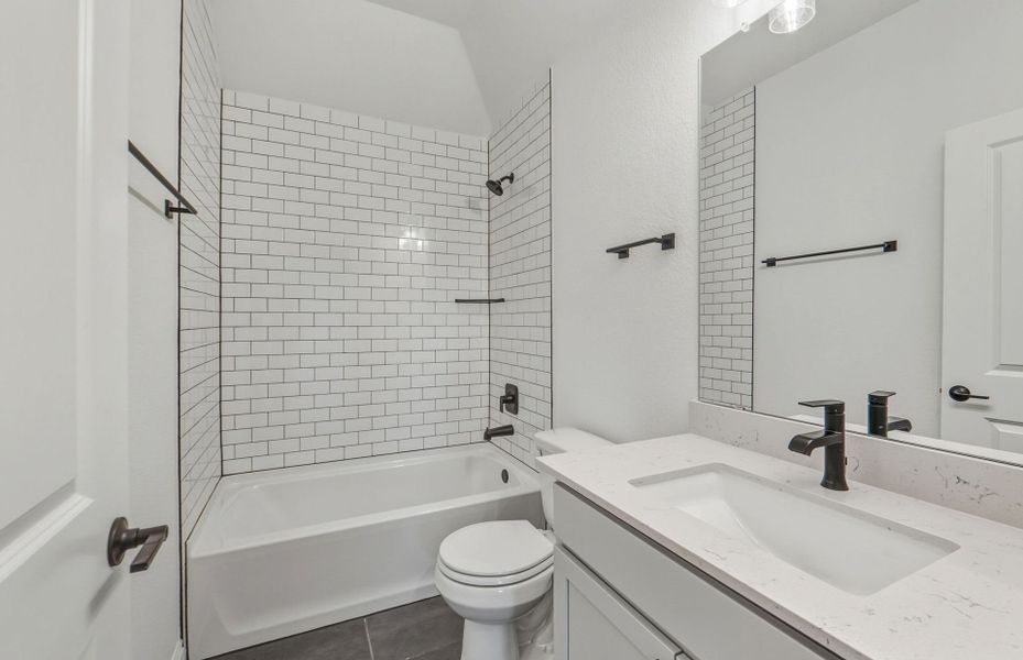 Furnished interior view inside a new home in West Cypress Hills, Spicewood (Image 7).