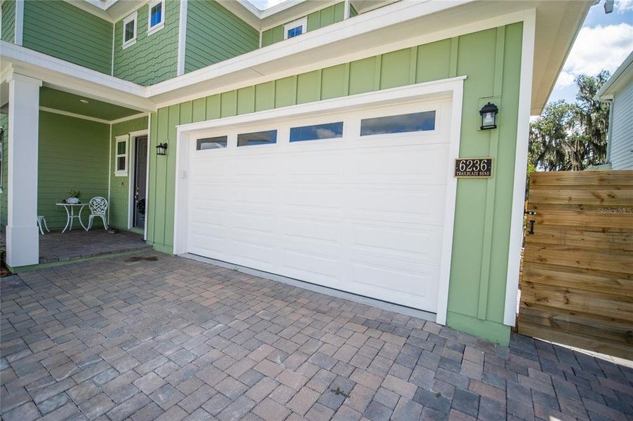 Exterior details and patio area of a home in Weslyn Park at Sunbridge, St. Cloud (Image 32).