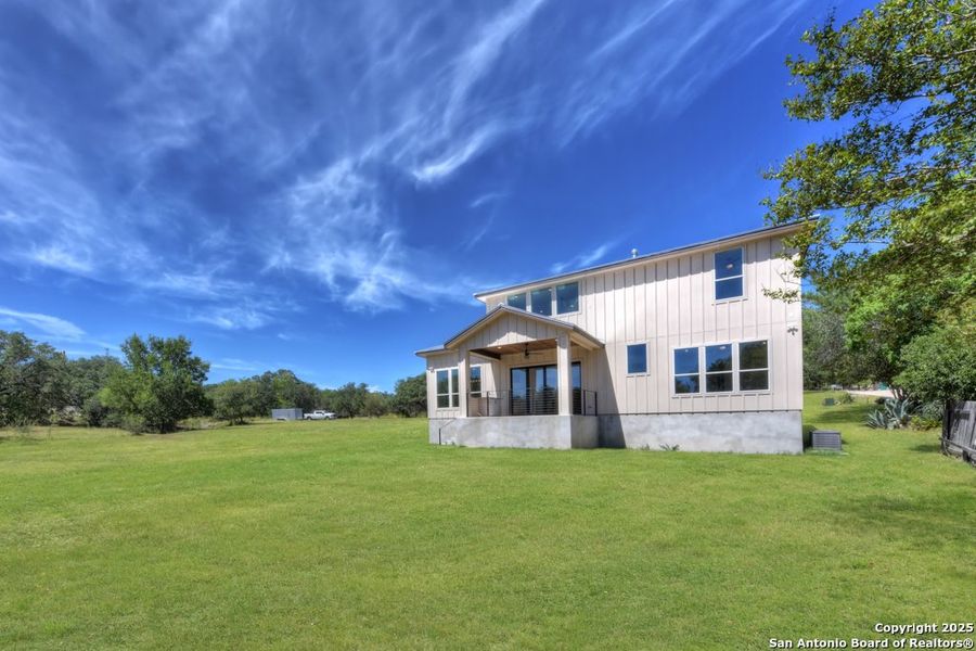 Front exterior of a new home in , Castroville, TX, highlighting curb appeal (Image 18). Front exterior of a new home in , Castroville, TX, highlighting curb appeal (Image 18).