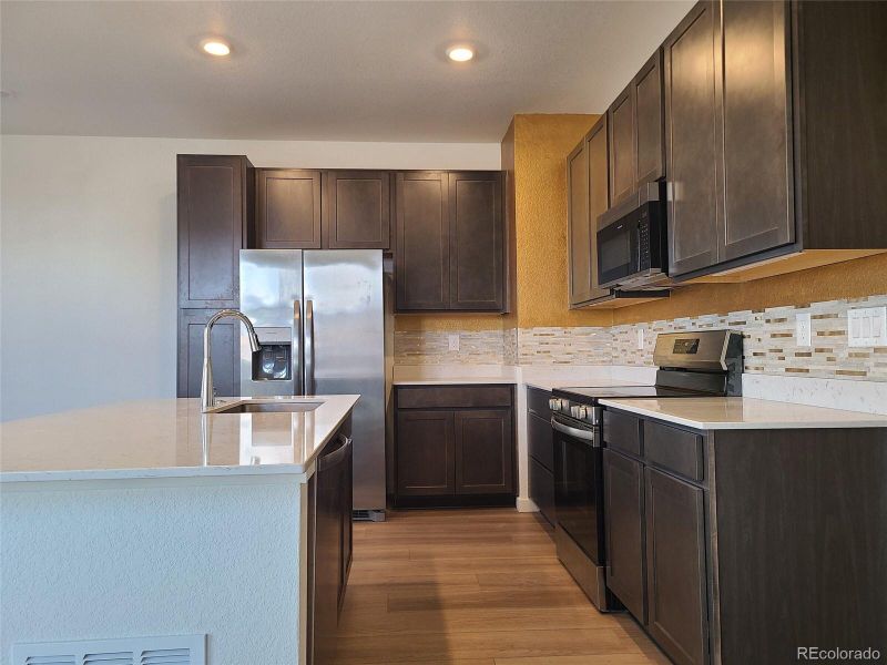Furnished interior view inside a new home in , Arvada (Image 8).