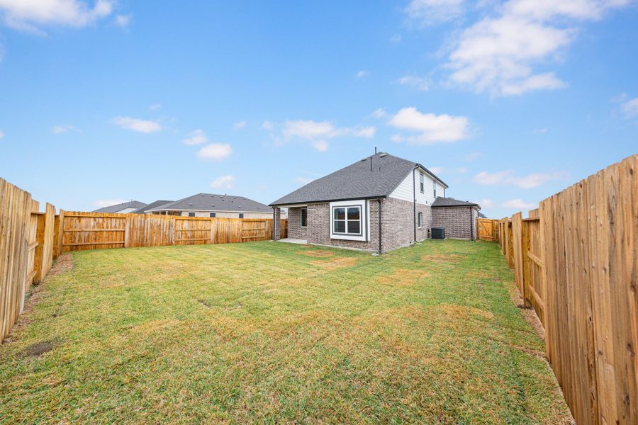 Exterior details and patio area of a home in River Ranch, Dayton (Image 3).