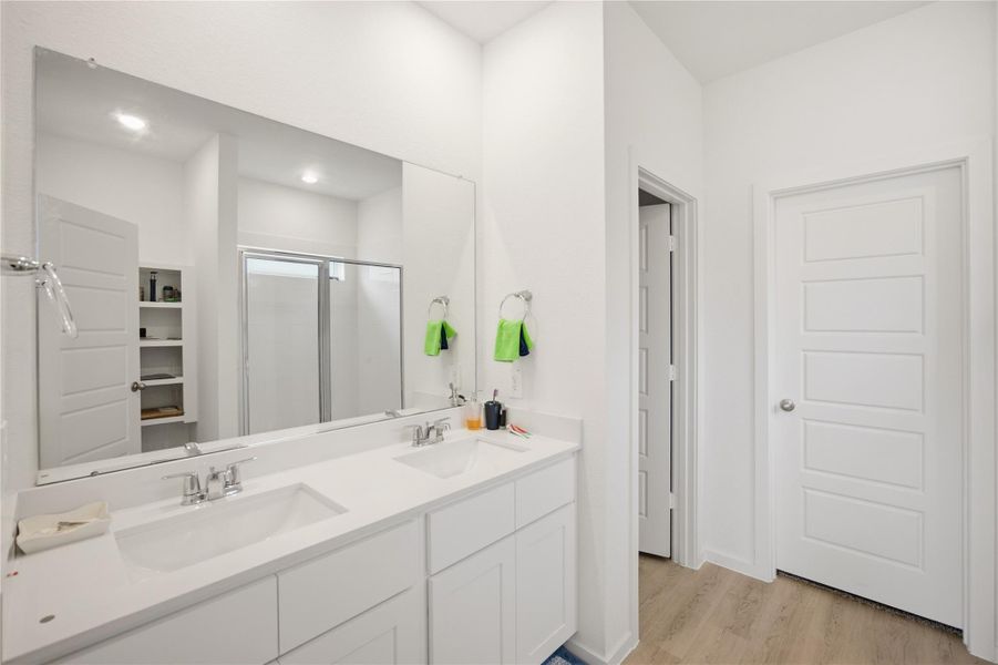 Primary bathroom — Spacious ensuite with dual-sink vanity. Primary bathroom — Spacious ensuite with dual-sink vanity.
