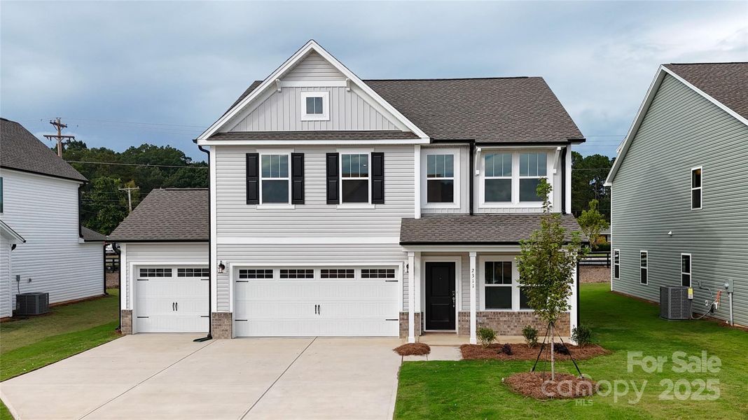 Front exterior of a new home in Morrow Brook, Albemarle, NC, highlighting curb appeal (Image 2).