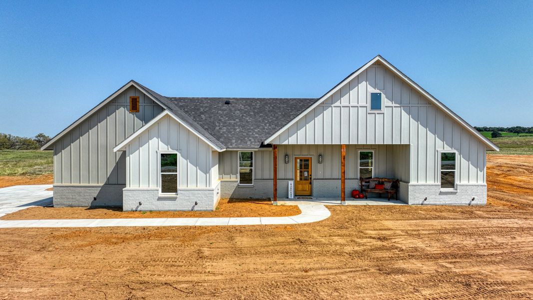 Representative exterior photo of a completed home built from the Loretta by Zeal Home Builders in Parallel Pastures, Poolville, TX (Image 1).