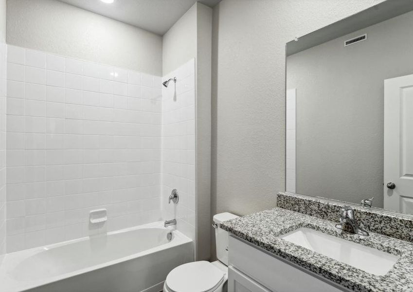 The secondary bathroom has a tub/shower combination.