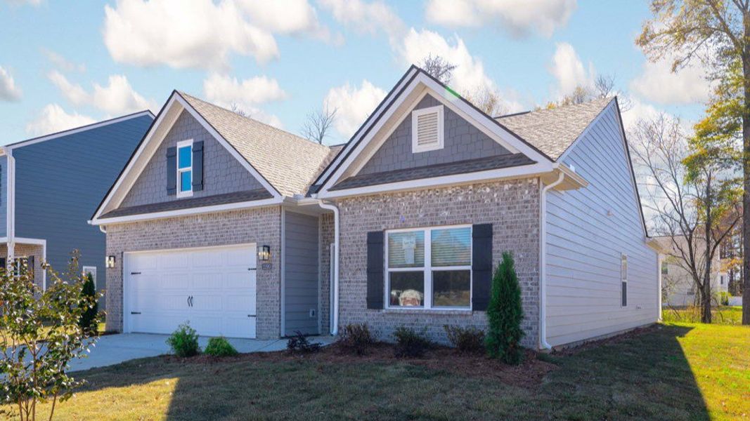 Front exterior of a new home in Fairview Hills, Cleveland, TN, highlighting curb appeal (Image 1). Front exterior of a new home in Fairview Hills, Cleveland, TN, highlighting curb appeal (Image 1).